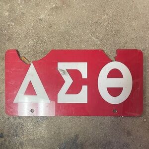 Red Greek Letters Sign